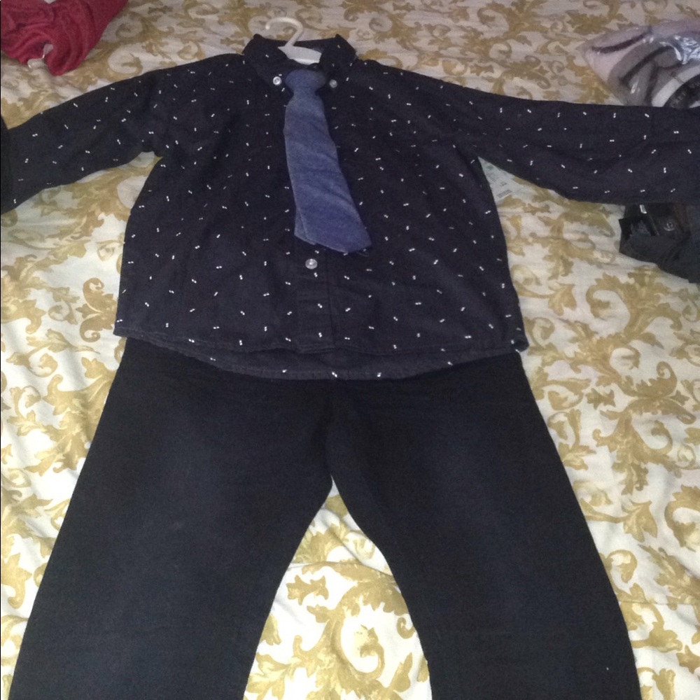 Boys black jeans and navy blue shirt with tie